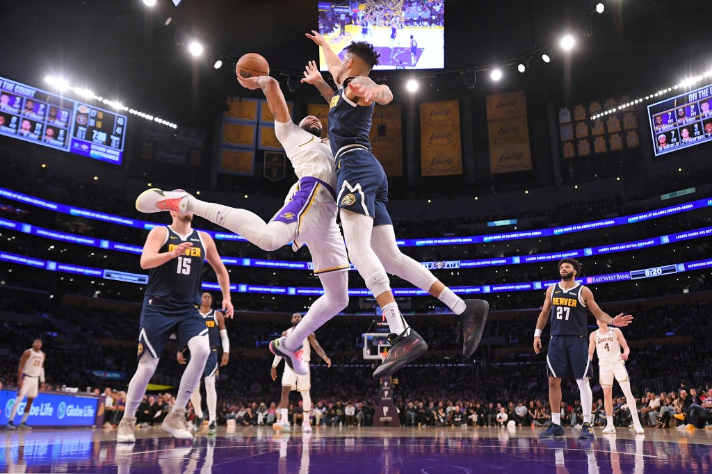 Michael Malone memecahkan rekor kemenangan franchise Doug Moe, Nuggets mengalahkan Lakers